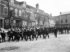 Band marching down Market Hill