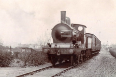 No 476 leaves the station, c.1905